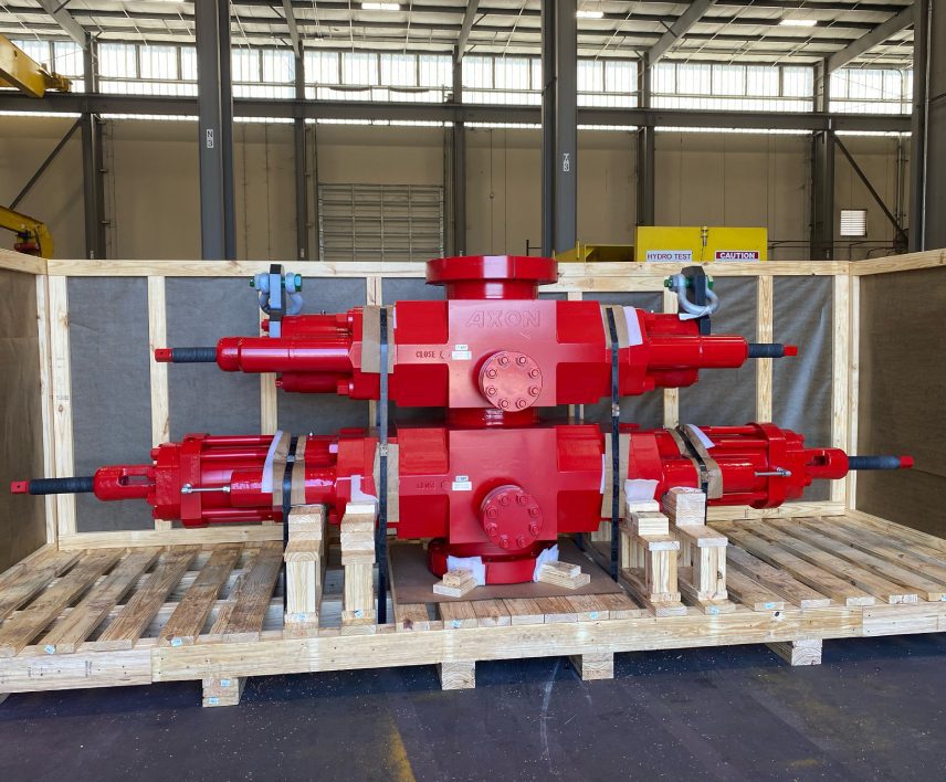 Red Axon wellhead assembly in crate.